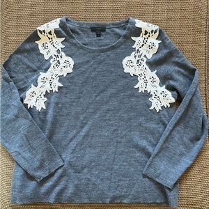 J. Crew sweater with detailing.